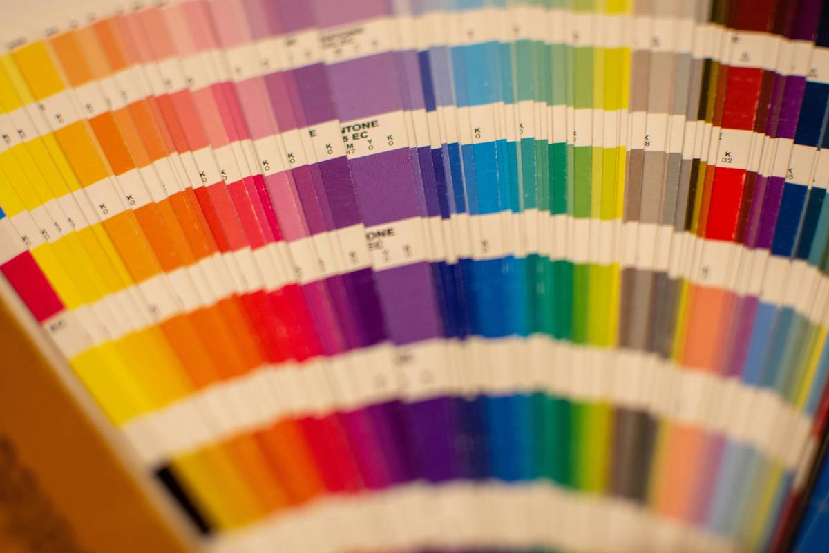 Small business owner applying canva design tricks to social media ad with measurable ROI